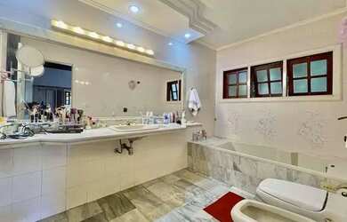 Imagem: A casa em condomínio possui 3 Dormitórios, 4 Banheiros, 3