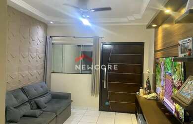 Imagem: A casa possui 3 Dormitórios, 2 Banheiros, 2 Vagas na garagem