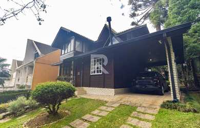 Imagem: A casa possui 3 Dormitórios, 4 Banheiros, 4 Vagas na garagem