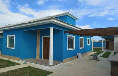 Imagem: A casa possui 3 Dormitórios, 3 Banheiros e 3 Vagas na garagem