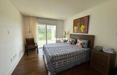 Imagem 10: Luxo, Conforto e Exclusividade: Residência de 6 Suítes com Piscina no Condomínio Horizonta