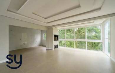 Imagem: A casa possui 3 Dormitórios, 3 Banheiros, 4 Vagas na garagem