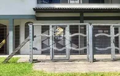 Imagem: A casa possui 5 Dormitórios, 5 Banheiros, 2 Vagas na garagem