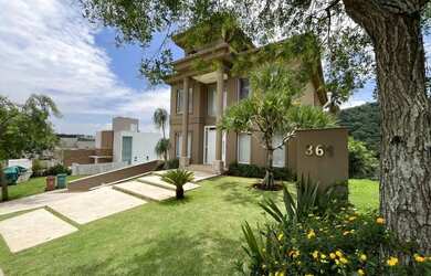 Imagem: A casa em condomínio possui 5 Dormitórios, 5 Banheiros, 5