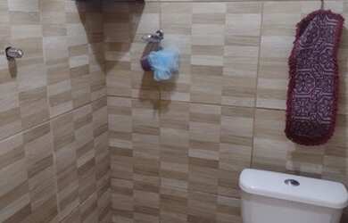 Imagem: A casa possui 2 Dormitórios, 2 Banheiros, 2 Vagas na garagem