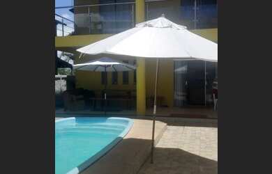 Imagem: A casa em condomínio possui 4 Dormitórios, 4 Banheiros, 4