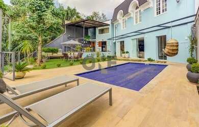 Imagem: A casa em condomínio possui 4 Dormitórios, 4 Banheiros, 3