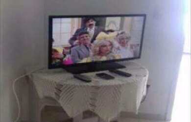 Imagem: O apartamento possui 2 Dormitórios, 1 Banheiro, 1 Vaga na garagem