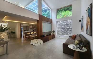 Imagem: A casa possui 5 Dormitórios, 5 Banheiros, 4 Vagas na garagem