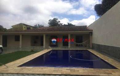 Imagem: A casa possui 3 Dormitórios, 5 Banheiros, 5 Vagas na garagem