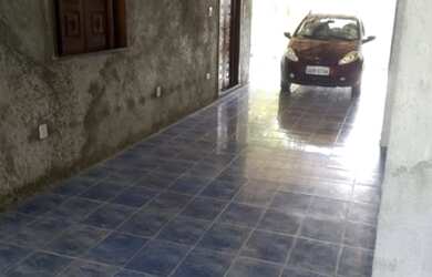 Imagem: A casa possui 2 Dormitórios, 2 Banheiros, 4 Vagas na garagem