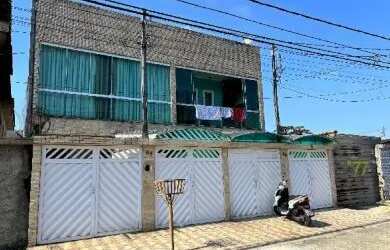 Imagem: A casa possui 3 Dormitórios, 1 Banheiro, 1 Vaga na garagem