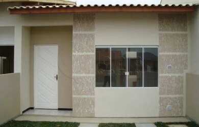 Imagem: A casa possui 3 Dormitórios, 1 Banheiro, 2 Vagas na garagem