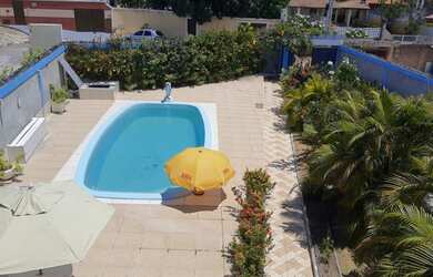 Imagem: A casa em condomínio possui 5 Dormitórios, 3 Banheiros, 5