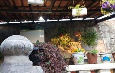 Imagem: A casa possui 2 Dormitórios, 1 Banheiro, 1 Vaga na garagem