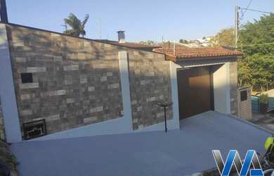 Imagem: A casa possui 3 Dormitórios, 3 Banheiros, 3 Vagas na garagem