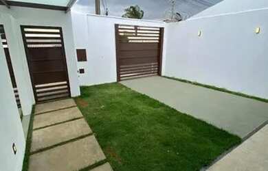 Imagem: A casa possui 2 Dormitórios, 1 Banheiro, 2 Vagas na garagem