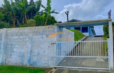 Imagem: A casa possui 3 Dormitórios, 1 Banheiro, 1 Vaga na garagem