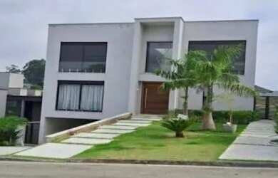 Imagem: A casa em condomínio possui 4 Dormitórios, 5 Banheiros, 5