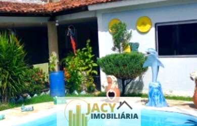 Imagem: A casa possui 3 Dormitórios, 3 Banheiros, 3 Vagas na garagem