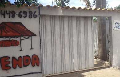 Imagem: A casa possui 3 Dormitórios, 2 Banheiros, 4 Vagas na garagem