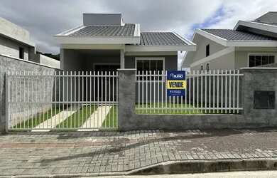 Imagem: A casa possui 2 Dormitórios, 2 Banheiros, 1 Vaga na garagem