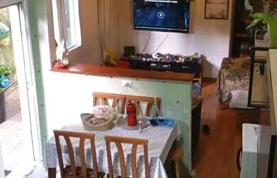 Imagem: A casa possui 2 Dormitórios, 2 Banheiros, 3 Vagas na garagem