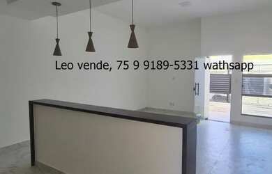 Imagem: A casa possui 3 Dormitórios, 2 Banheiros, 2 Vagas na garagem