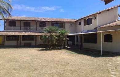 Imagem: A casa possui 3 Dormitórios, 3 Banheiros, 3 Vagas na garagem