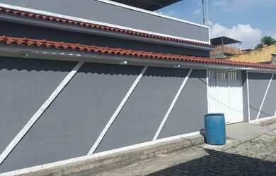 Imagem: A casa em condomínio possui 2 Dormitórios, 4 Banheiros, 3