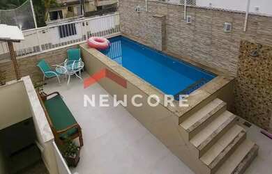 Imagem: A casa em condomínio possui 4 Dormitórios, 4 Banheiros, 1