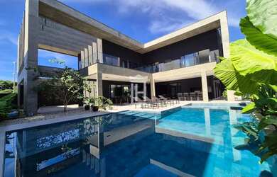 Imagem: A casa possui 5 Dormitórios, 5 Banheiros, 3 Vagas na garagem