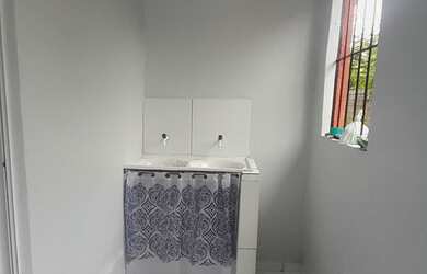 Imagem: A casa possui 2 Dormitórios, 2 Banheiros e está localizado