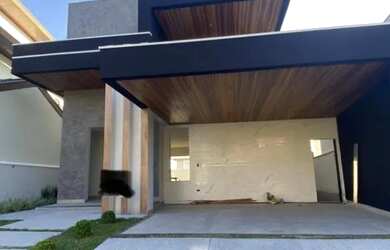 Imagem: A casa em condomínio possui 4 Dormitórios, 5 Banheiros, 4