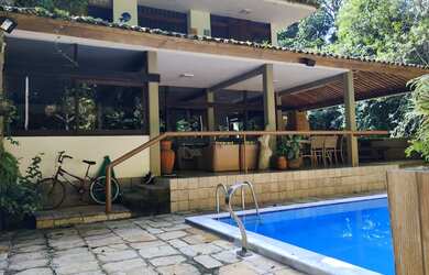 Imagem 1: Casa em condomínio beira de pista de aldeia, com vista para Mata atlântica