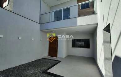 Imagem: A casa possui 3 Dormitórios, 2 Banheiros, 2 Vagas na garagem