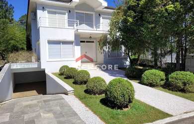 Imagem: A casa em condomínio possui 5 Dormitórios, 5 Banheiros, 5