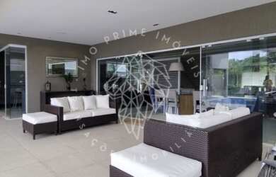 Imagem: A casa em condomínio possui 5 Dormitórios, 5 Banheiros, 3