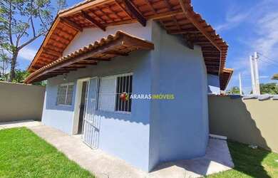 Imagem: A casa possui 2 Dormitórios, 1 Banheiro, 1 Vaga na garagem