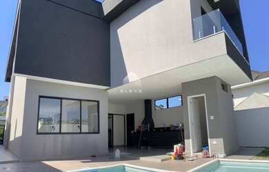 Imagem: A casa em condomínio possui 4 Dormitórios, 5 Banheiros, 4