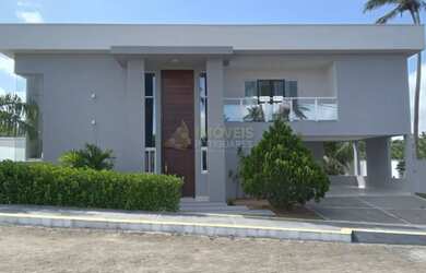 Imagem: A casa possui 4 Dormitórios, 5 Banheiros, 2 Vagas na garagem