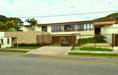 Imagem: A casa em condomínio possui 4 Dormitórios, 5 Banheiros, 4