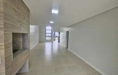 Imagem: A casa possui 3 Dormitórios, 2 Banheiros, 2 Vagas na garagem