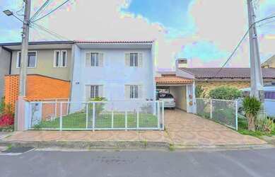 Imagem: A casa possui 2 Dormitórios, 3 Banheiros, 3 Vagas na garagem