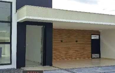 Imagem: A casa possui 3 Dormitórios, 2 Banheiros, 2 Vagas na garagem