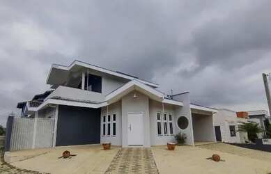 Imagem: A casa em condomínio possui 3 Dormitórios, 3 Banheiros, 2