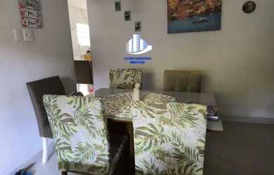 Imagem: A casa possui 3 Dormitórios, 2 Banheiros, 2 Vagas na garagem