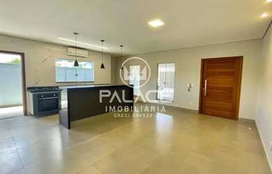 Imagem: A casa possui 2 Dormitórios, 2 Banheiros, 3 Vagas na garagem