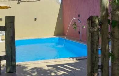 Imagem 2: Casa para temporada. Piscina, Churrasqueira, Acomodam 12 pessoase5 Vagas...