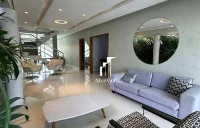 Imagem: A casa possui 4 Dormitórios, 5 Banheiros, 3 Vagas na garagem